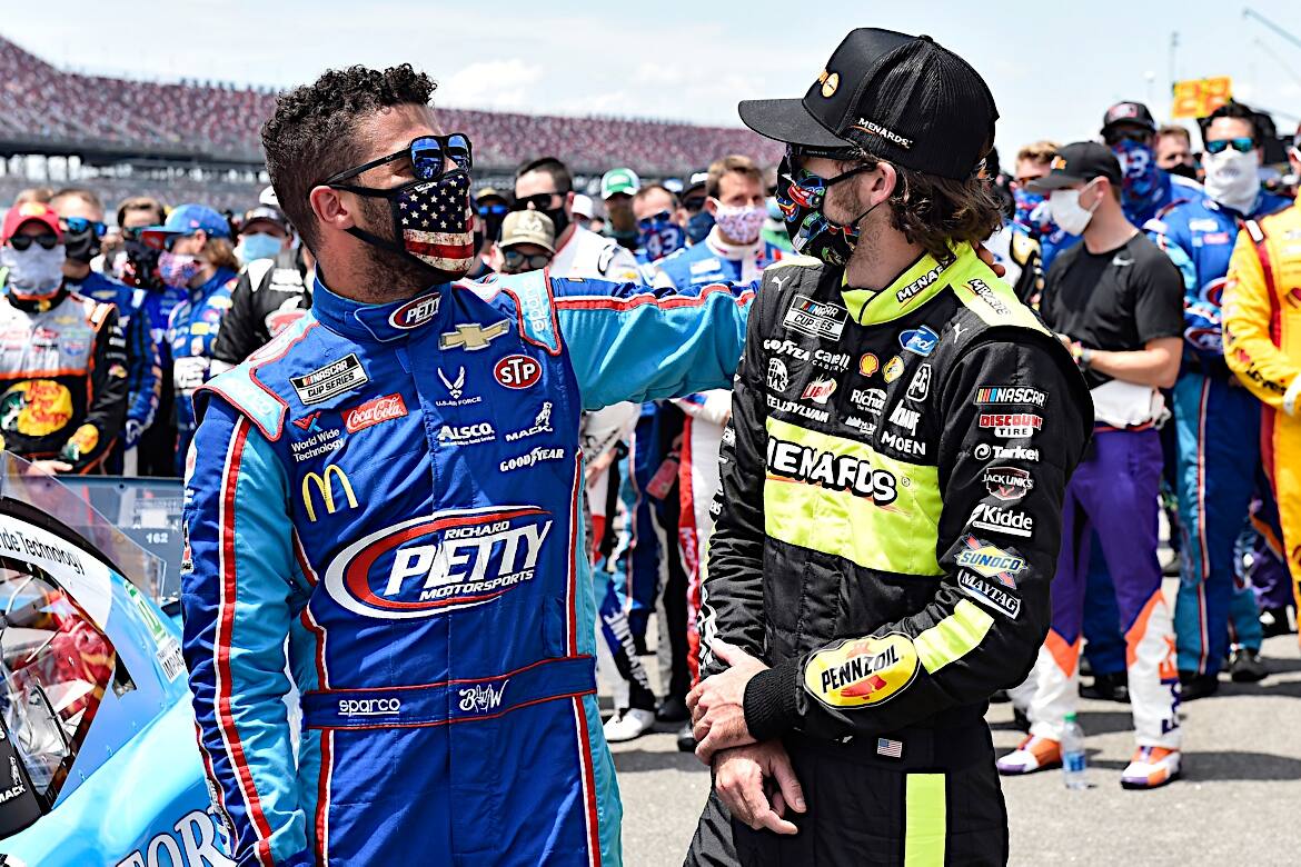 Wallace (left) was the target of a racist incident Sunday in the NASCAR garage. Wallace (left) was the target of a racist incident Sunday in the NASCAR garage.