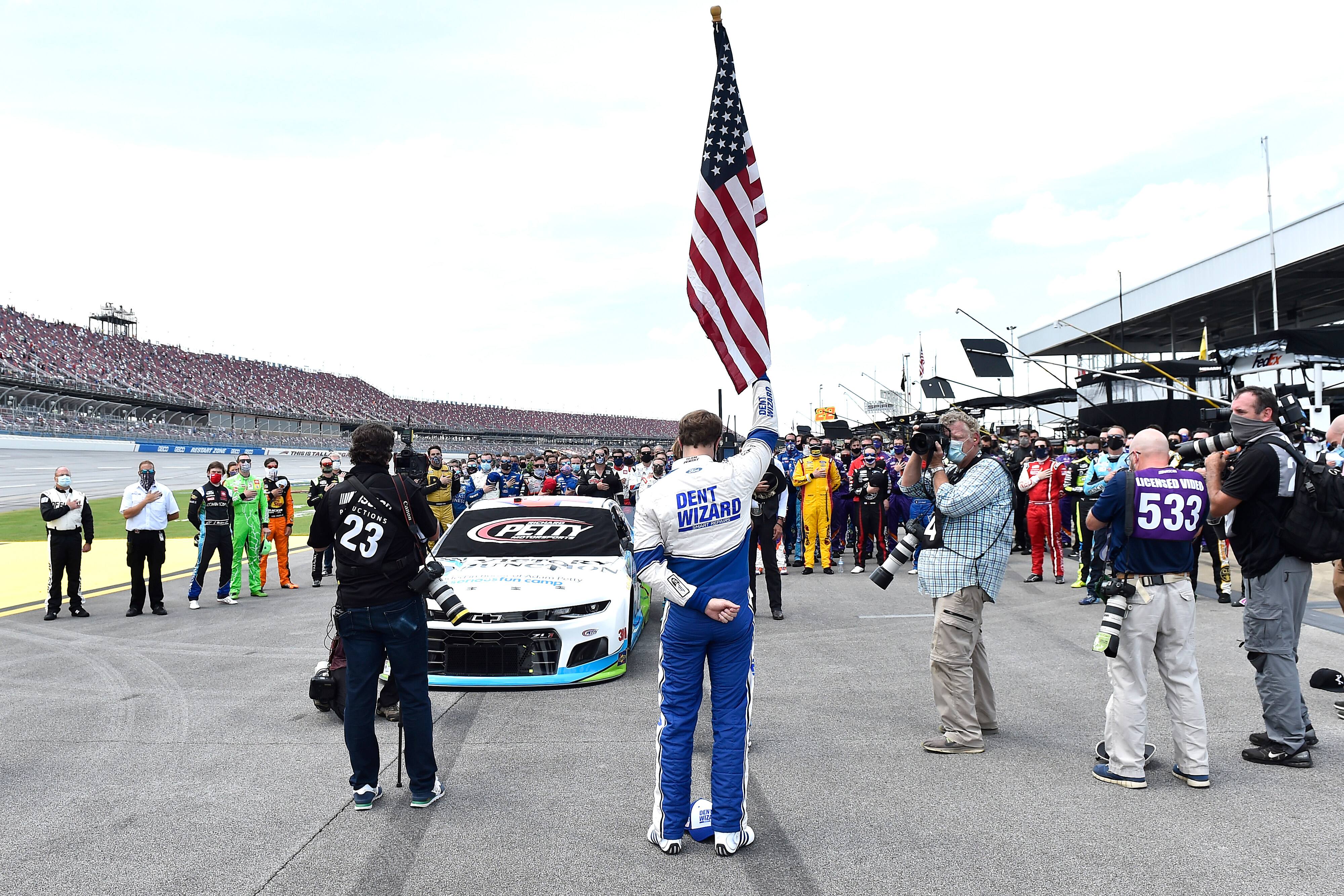 Prior to the race, the entire field of drivers and crew members rallied behind Bubba Wallace. Prior to the race, the entire field of drivers and crew members rallied behind Bubba Wallace.