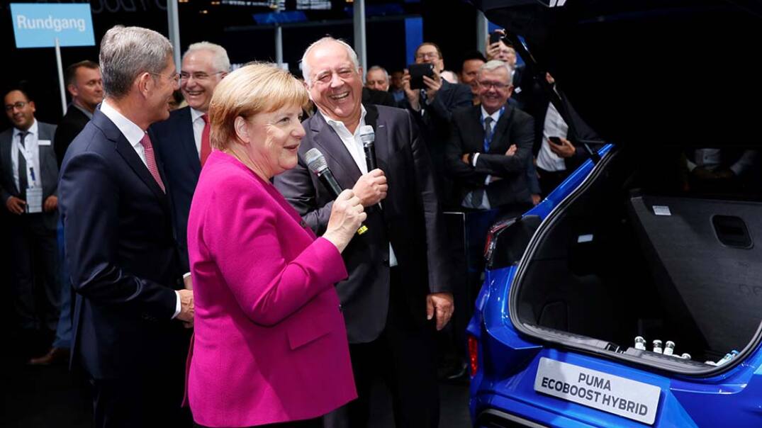 German Chancellor Angela Merkel and Ford of Germany CEO Gunnar Herrmann German Chancellor Angela Merkel and Ford of Germany CEO Gunnar Herrmann