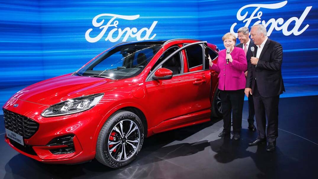 German Chancellor Angela Merkel and Ford of Germany CEO Gunnar Herrmann German Chancellor Angela Merkel and Ford of Germany CEO Gunnar Herrmann